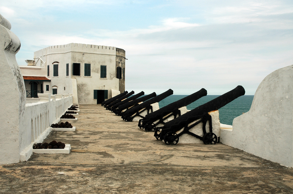 A row of cannons along the seaward ramparts of Cape Coast Castle